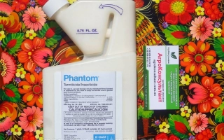 Флакон з фунгіцидом Phantom на фоні квітів - Привид