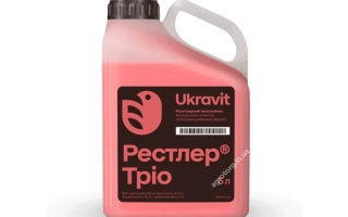 Красная канистра с этикеткой «Рестлер Тріо» от Ukravit - РЕСТЛЕР ТРИО