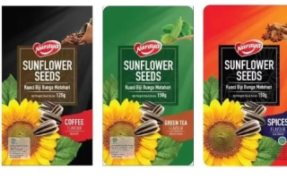 Пакет семян подсолнечника Nasoloda с изображением подсолнухов и ядра. - Насолода