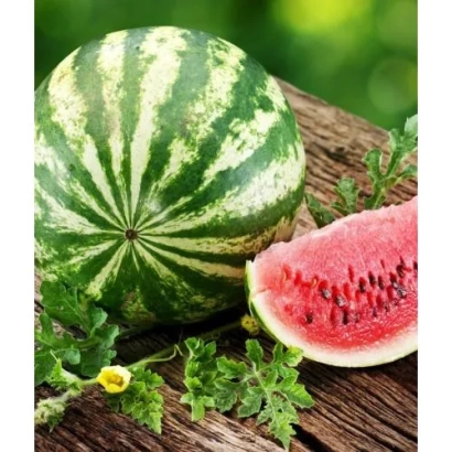 Watermelon on wooden surface with leaf and flower - DSV 01