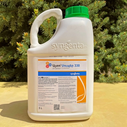 Bottle of fungicide Alto Cure 330 by Syngenta against green bushes - Altacor 330