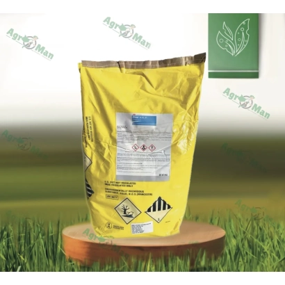 Yellow bag of fungicide on wooden stand against grass background - Ditan M-45