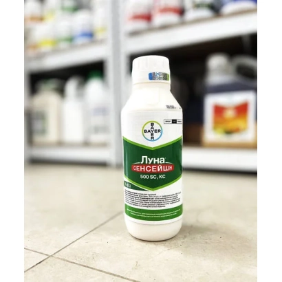 Bottle of Luna Sensation 500 SC fungicide on shelves with other products