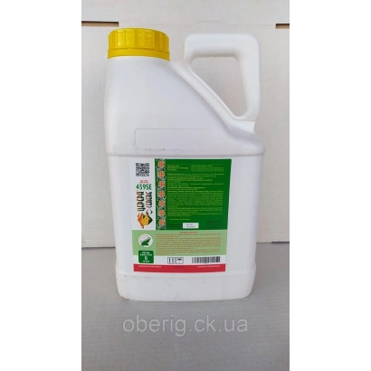 White jug with green label, no readable product name visible - CERERA 459