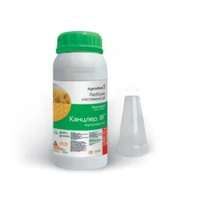 Bottle of herbicide Chancellor 30 with green cap and measuring spoon beside - Chancellor v.g.