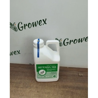 Bottle of herbicide HERBEX MD on wooden surface with Growex logo in background