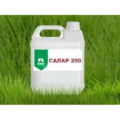 White canister with text SALAR 200 on green grass background