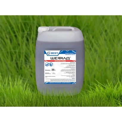 Канистра с гербицидом Шефилд на фоне зелёной травы
