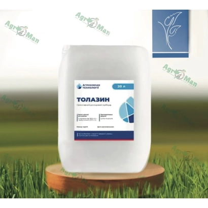 Біла канистра з етикеткою ТОЛАЗИН на зеленому фоні