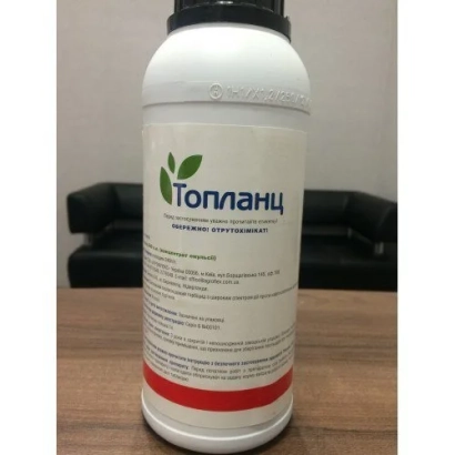 Бутелька з гербіцидом Топланц на дерев'яній поверхні - Топланц 240, к.е., (Клетодим, 240 г/л)