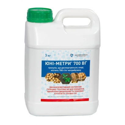 Bottle of herbicide YUNI-METRI 700 WG with plant imagery on label