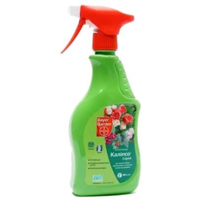 Зелений спрей-розпилювач з червоним носиком та етикеткою з зображенням квітів та написом Калібр - Прованто Спрей АL