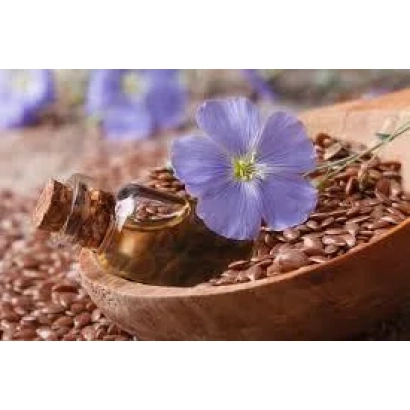Деревянная чаша с льняными семечками, льняным маслом и фиолетовым цветком льна - Дебют