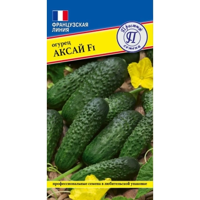 Семена огурца Аксай F1 на фоне зеленых огурцов