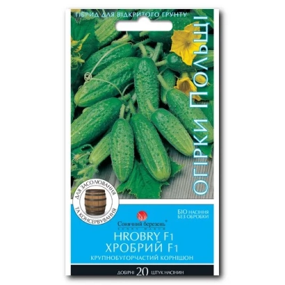 Пакет насіння огірків Хробри F1 з зображенням зелених огірків на фоні