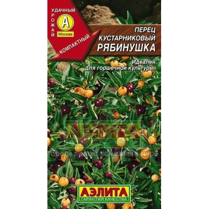 Seed packet of pepper Ryabinushka against a background of berry bushes