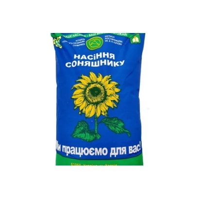 Пакет семян подсолнечника с изображением цветка и надписью на украинском языке - Стаер