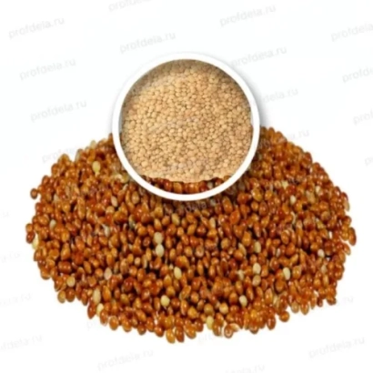 Продукт просо на білому фоні з чашкою зерен - ПРИВОЛЬНЕ