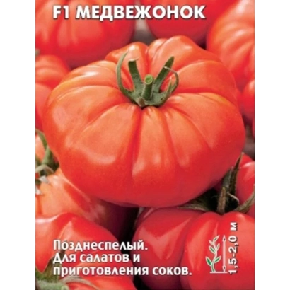 Red tomatoes of variety BEAR CUB on seed packaging