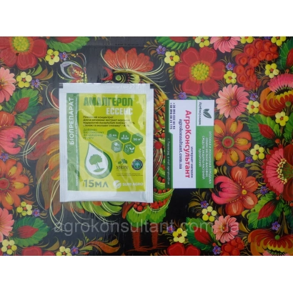 Удобрение Амалгерол Ессенс в упаковке на цветном фоне