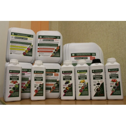 Set of bottles with fertilizers BIOPROFERM on white background