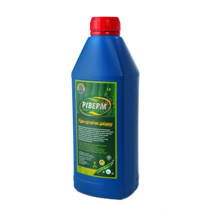 Blue bottle with red cap and label Riverm