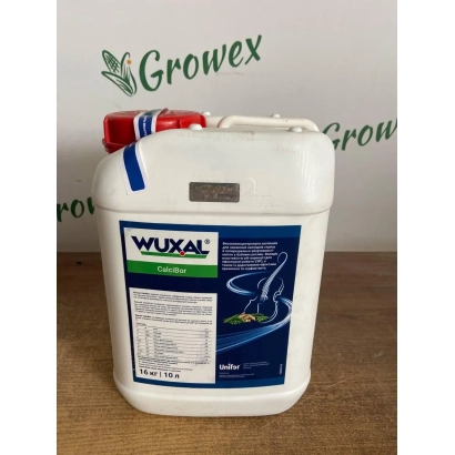 Белая канистра с этикеткой WUXAL на деревянной поверхности. - ВУКСАЛ (WUXAL)