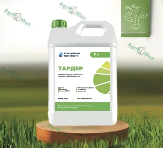 Бутелечка з продуктом ТАРДЕР на дерев'яній підставці на фоні трави. - ОРГАНИЦЯ ТМ